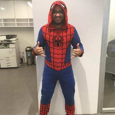 Me wearing a Spider-Man onesie at the corporate offices of Saks 5th Avenue